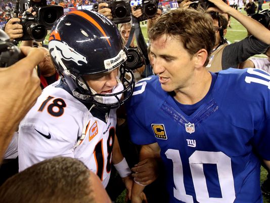 1379289701000-09-15-2013-Peyton-Eli-Getty-images
