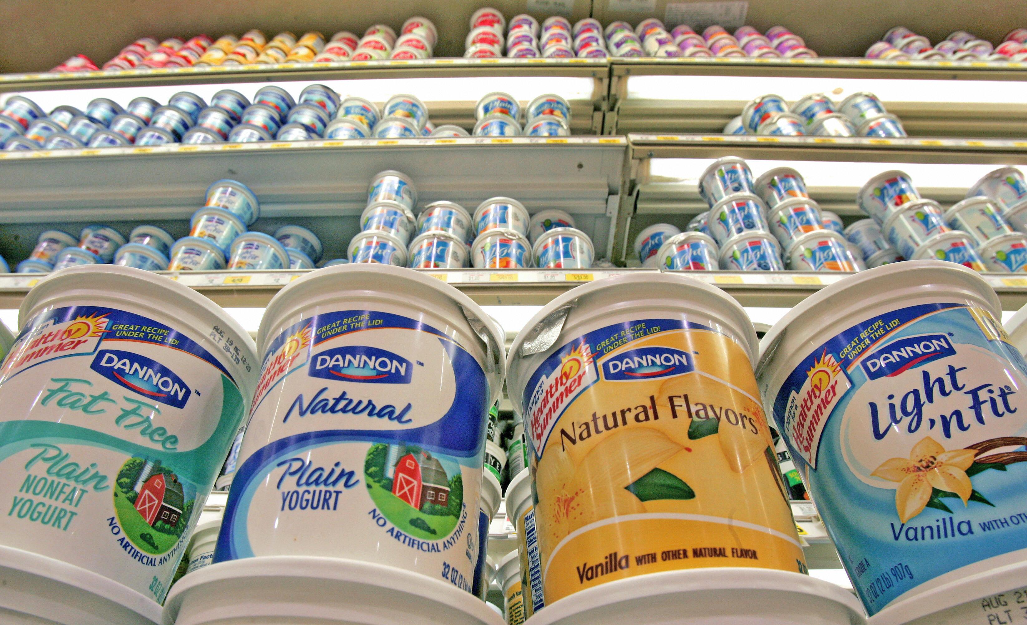 Dannon yogurt waits on a dairy shelve fo