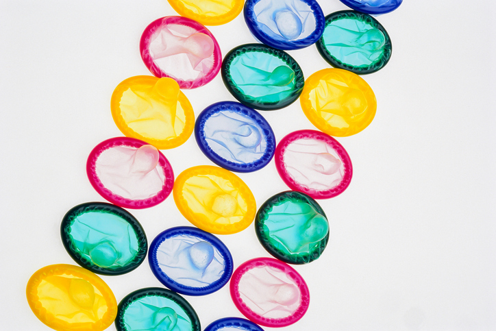 A Close-up of a Rainbow of Colourful Condoms