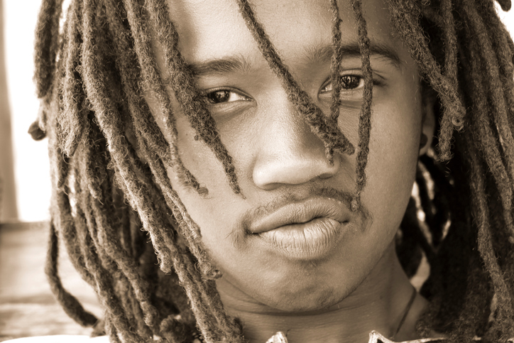 Close-Up Portrait Of Boy With Dreadlocks